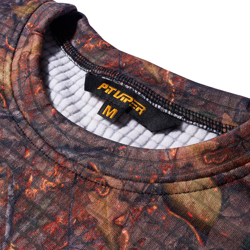 | u_want_this.JPG | Close-up of a camouflage-patterned t-shirt collar with a black neck label reading 'PIT VIPER' and 'M' in yellow text, showing a white quilted inner lining.