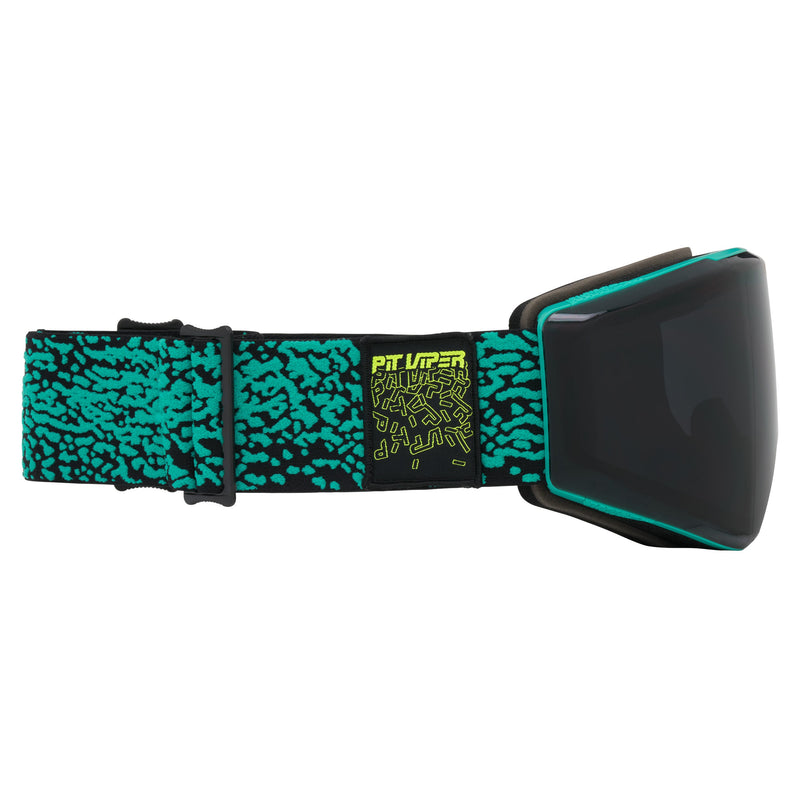 HDPV Smoke | even_more_side_view.JPG | Pit Viper snow goggles with a black and teal speckled strap and a dark tinted lens, shown against a plain white background.