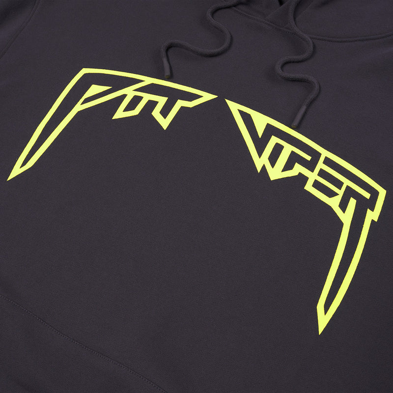 | im_ready_for_my_closeup.JPG | Close-up of a black hoodie featuring a large, stylized neon yellow 'VFT' graphic across the chest, with black drawstrings visible at the top.