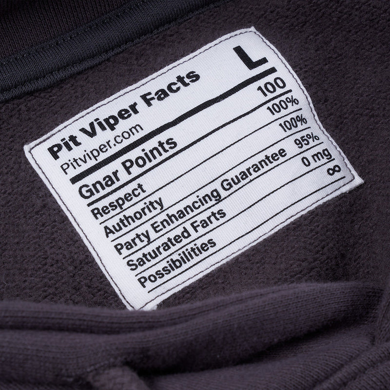 | detail_shot.JPG | Close-up of a white embroidered label sewn onto a dark charcoal hoodie. The label reads 'Pit Viper Facts' with 'L' size and humorous lines like 'Gnar Points' and 'Respect Authority Party Enhancing Guarantee Saturated Farts Possibilities'.