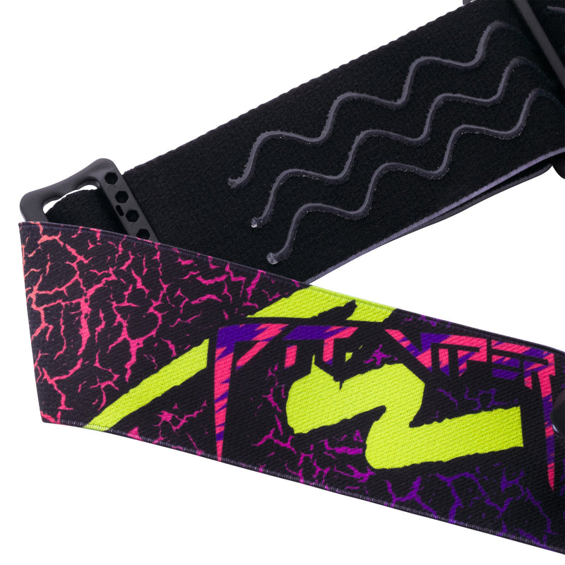 Pink Purple | it_a_strap.JPG | Close-up of a black adjustable strap with a black wavy textured underside and a printed fabric upper section featuring a neon pink crackle pattern, lime green graphic, and purple lettering on a white background.