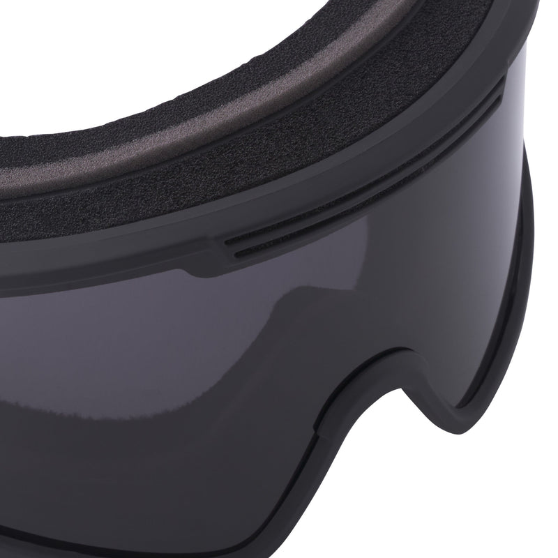 Smoke / Small | im_ready_for_my_closeup.JPG | Close-up of a ski or snowboard goggles showing the dark gray tinted lens, black frame, and textured black foam padding on a white background.