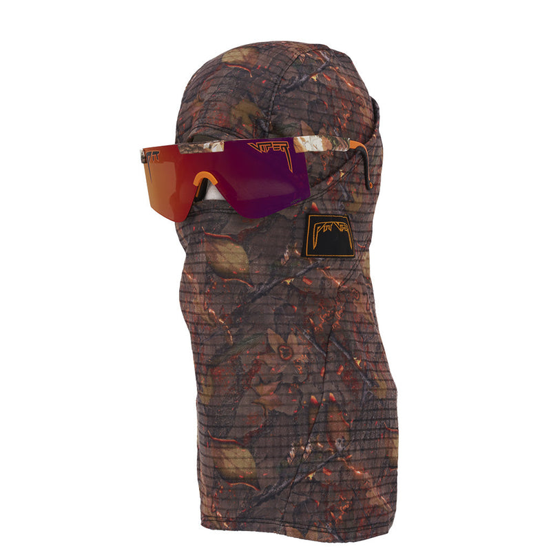 | side_view.JPG | A camouflage balaclava face mask with a built-in neck gaiter and integrated sunglasses, shown on a plain white background.
