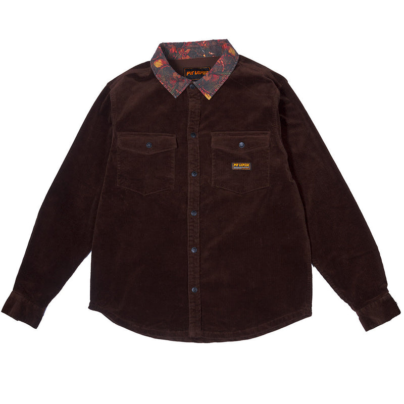 | full_frontal.JPG | A dark brown corduroy button-up shirt by Pit Viper, featuring a patterned inner collar with red, orange, and black tones, and two buttoned chest pockets.