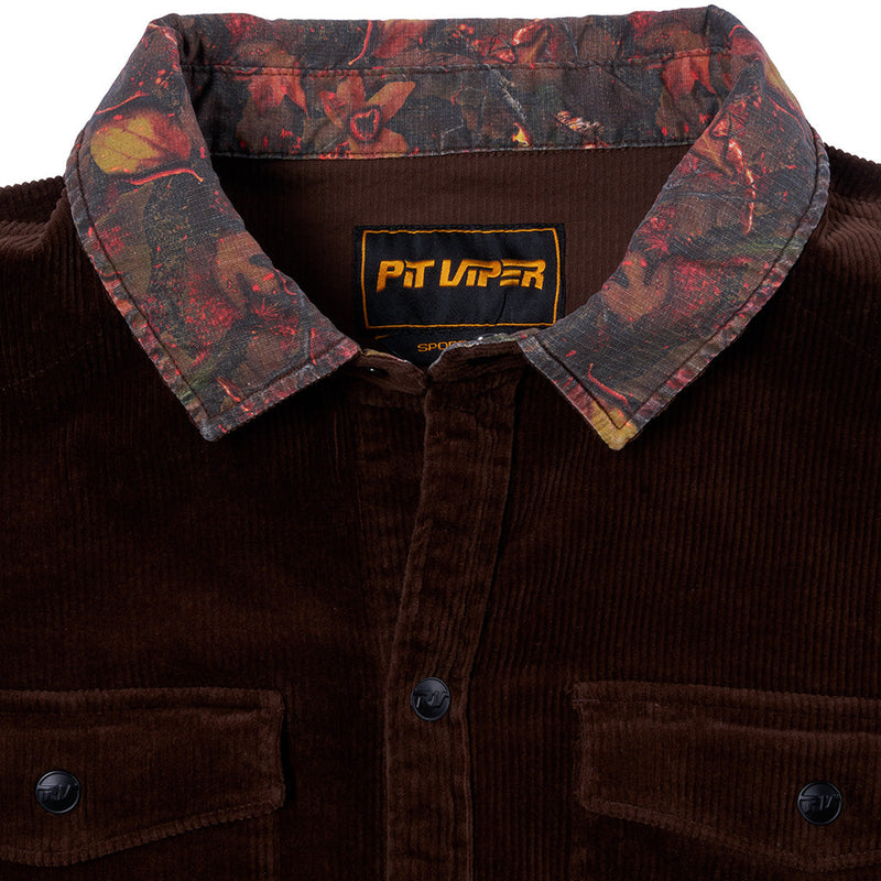 | collar.JPG | Close-up of a dark brown corduroy button-up shirt jacket with a patterned inner collar and a visible PIT Viper neck label.