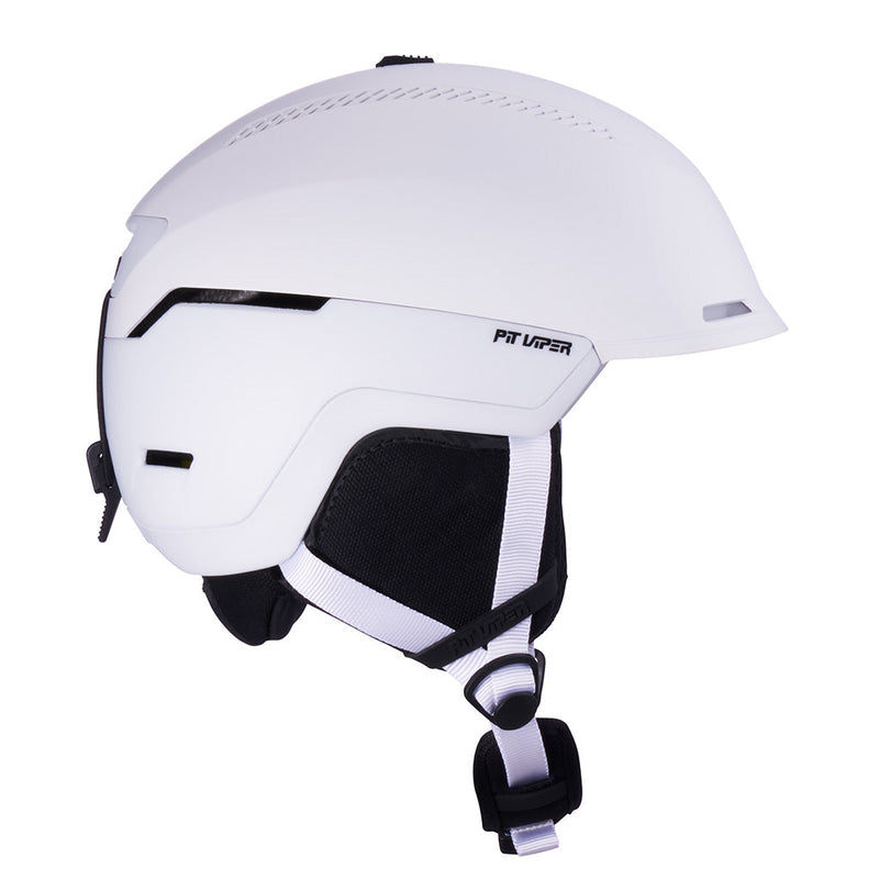| even_more_side_view.JPG | A white ski helmet with black accents, including the chin strap and ventilation slots, featuring the 'PIT VIPER' logo on the side, shown against a plain white background.