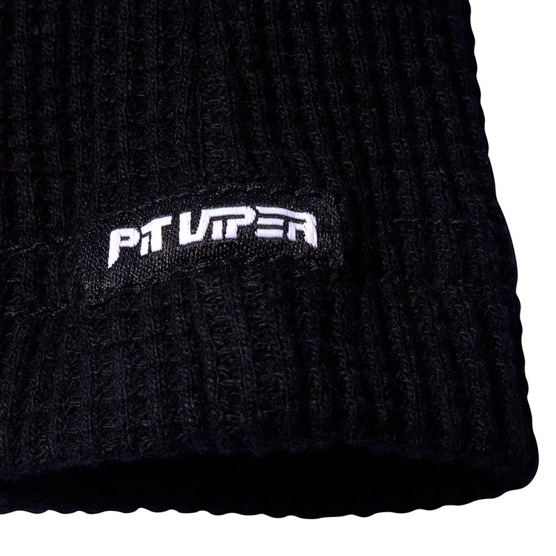 | another_logo.JPG | Close-up of a black ribbed knit beanie with a white embroidered 'PIT VIPER' logo patch on the cuff.