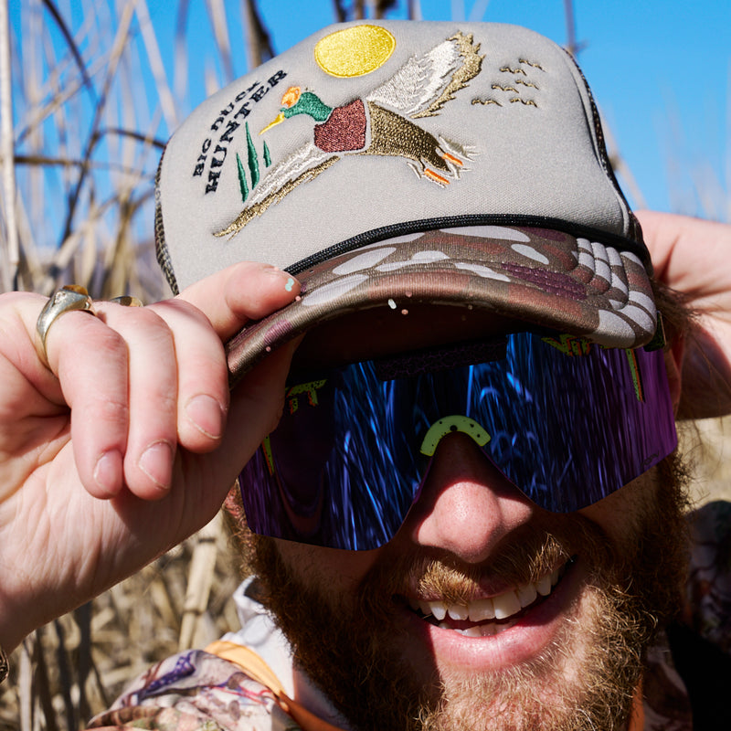 | photo_of_person.JPG | A photo of a person wearing the Duck Hunt hat from Pit Viper