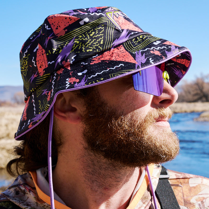 | photo_of_person_2.JPG | Person wearing the guy on a river wearing the Sport Beer Bucket hat from Pit Viper.