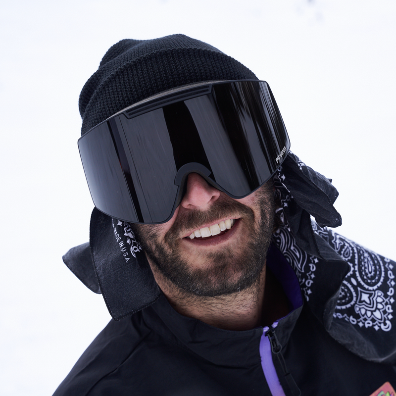 | photo_of_person.JPG | Person wearing a black beanie with black goggles on a white background.