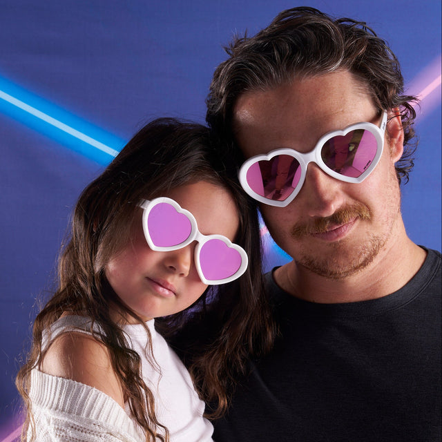 A dad and daughter wearing matching Pit Viper Admirer Sunglasses