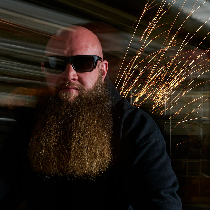 / Z87+ HDPV Polarized Smoke | picture_of_person.jpg | Man wearing The Exec Revlock Sunglasses from Pit Viper