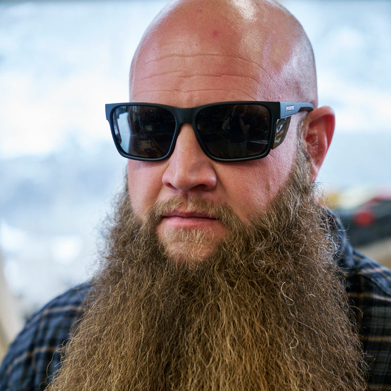 / Z87+ HDPV Polarized Smoke | picture_of_person.jpg | Man wearing The Exec Revlock Sunglasses from Pit Viper