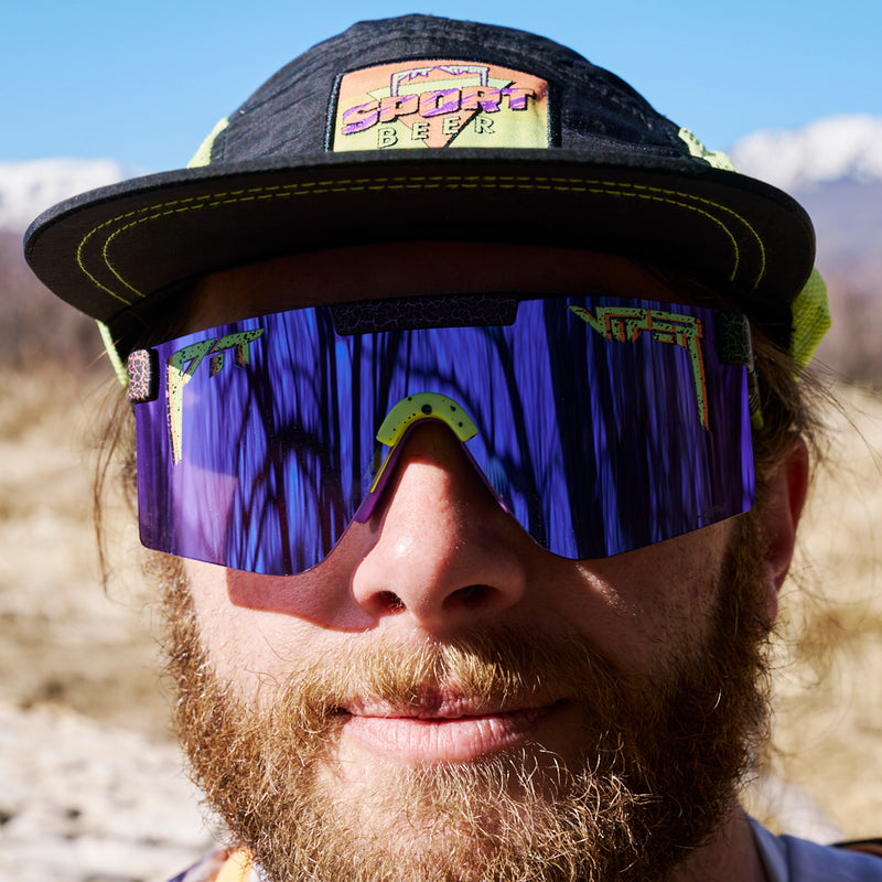 | photo_of_person_2.JPG | A close up shot of a bearded guy wearing the Sport Beer Hot Mesh Hot from Pit Viper