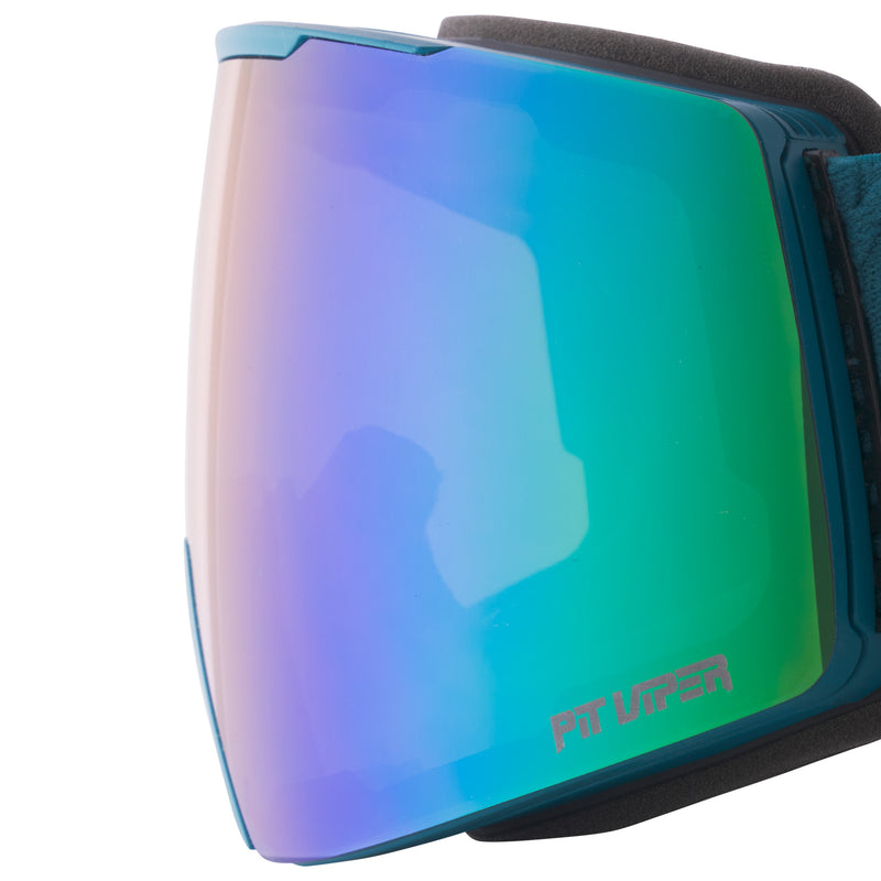Blue-Green | toric_lens.JPG | Close-up of a ski or snowboard goggle lens with a blue-to-green mirrored finish and purple reflections, showing the PitUPER logo near the bottom right.