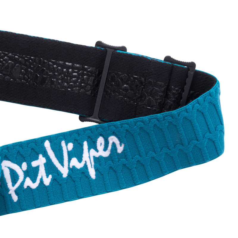 Blue-Green | it_a_strap.JPG | A close-up of a teal and black adjustable belt with a textured pattern, featuring the brand name 'Pit Viper' embroidered in white script on the front.