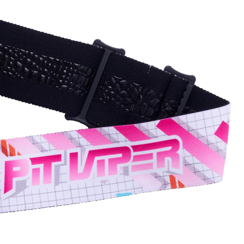 Pink | it_a_strap.JPG | A close-up of a black goggle strap with a white, pink, and gray patterned lower band featuring the stylized text 'PIT Viper' in pink and white.