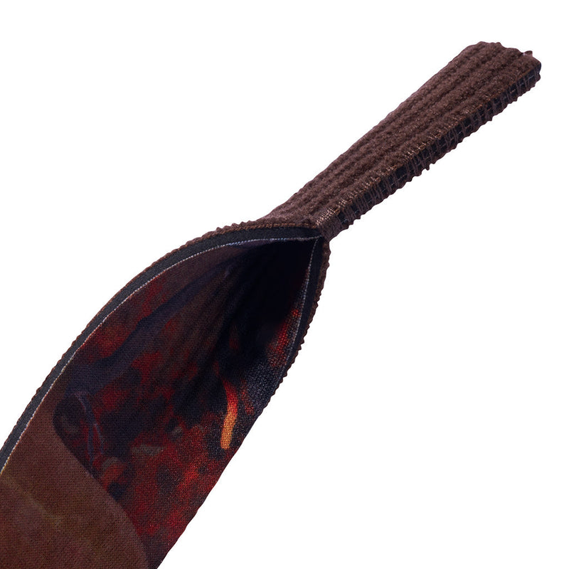 Close-up of a dark brown textured fabric pouch or sleeve with a long ribbed strap, shown on a plain white background.
