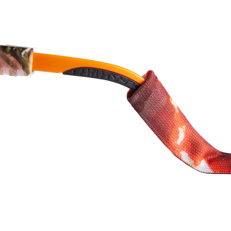 | slide_on.JPG | Close-up of a bow accessory with a bright orange shaft, a black textured grip, and a red-orange camouflage fabric sleeve on a plain white background.